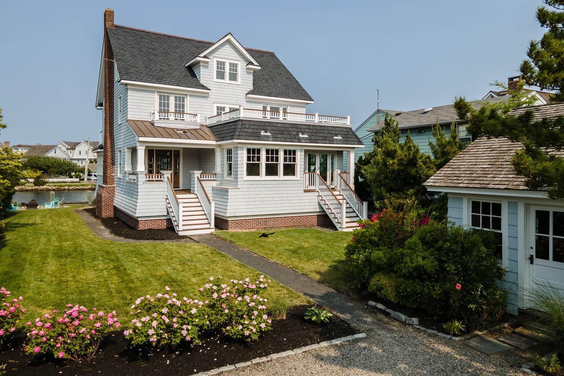 13. Single Family Homes for Sale at Ideally Situated Home Offers the Best of Waterfront Living 974 Barnegat Lane Mantoloking, New Jersey 08738 United States