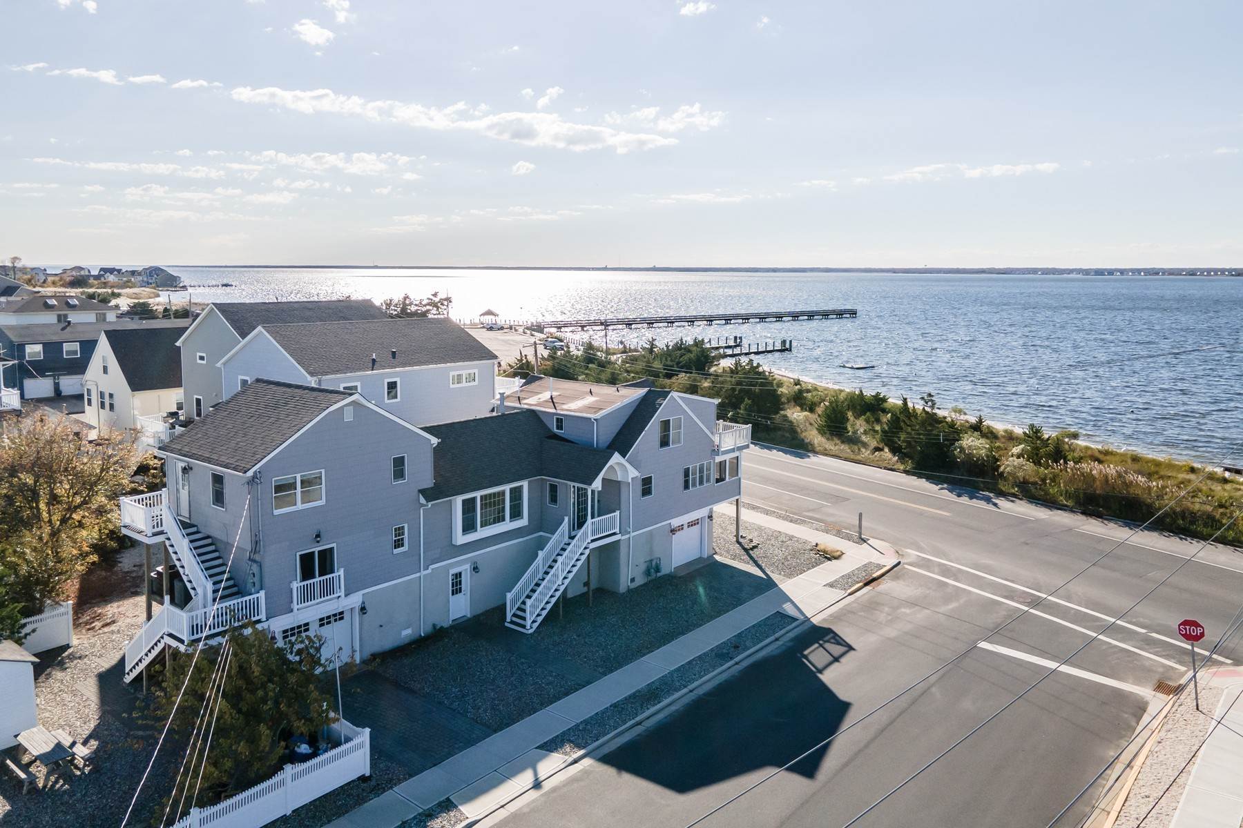 Single Family Homes for Sale at Recently Renovated Mother/Daughter Bayfront Home 1200 S Bayview Avenue Seaside Park, New Jersey 08752 United States